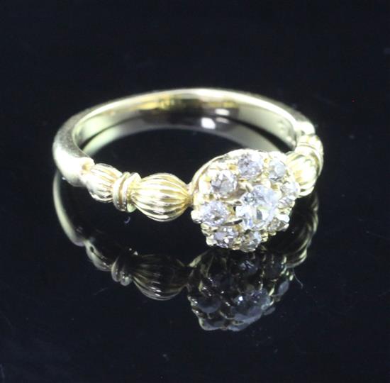 A Victorian 18ct gold and diamond cluster ring, size J.